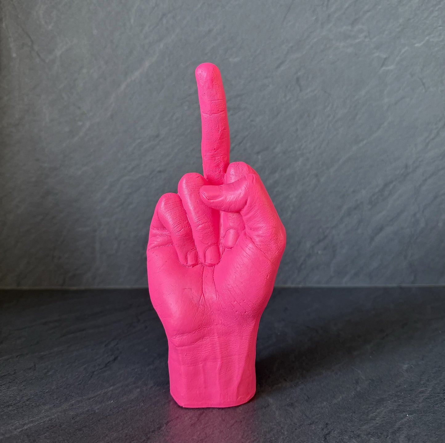 
                  
                    Sculpture main doigt d'honneur rose
                  
                
