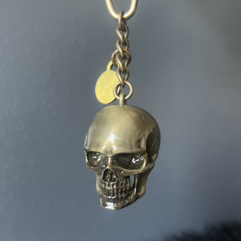 
                  
                    Porte-clé tête de mort gold - mat
                  
                