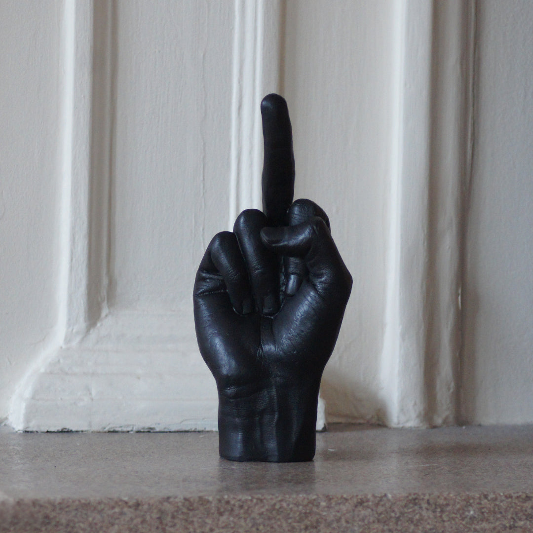 
                  
                    Sculpture main doigt d'honneur noire
                  
                